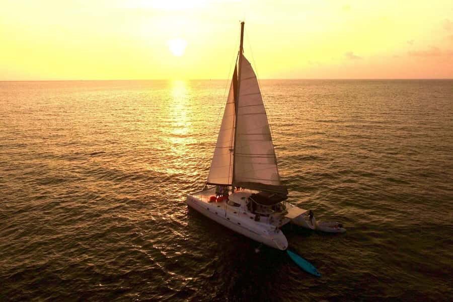 Grand Bay: BBQ Dinner on Catamaran & Short Sunset Tour - Logistics that matter: meeting point, dinghy transfer, and no pickup