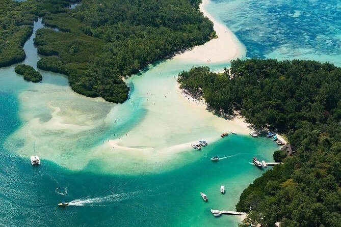 Luxury All-Inclusive Catamaran Cruise to Ile aux Cerfs and GRSE Waterfall - Stop 1: Grande Riviere Sud Est Waterfall Meets the Indian Ocean