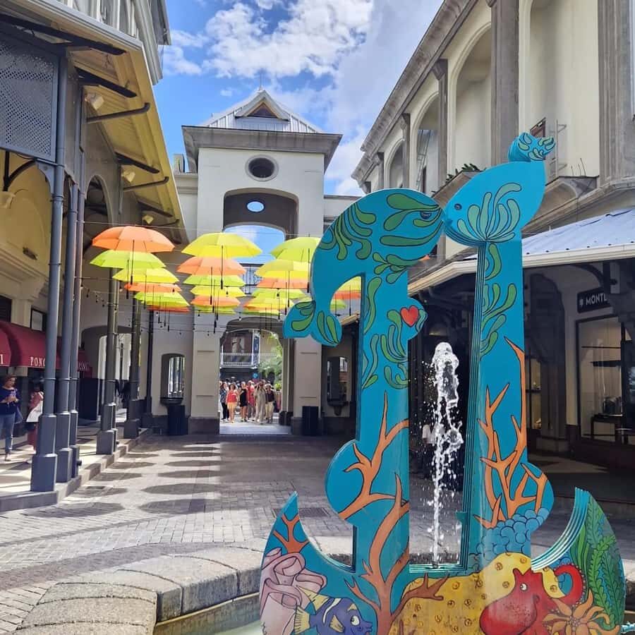 Port Louis: City Tour with Street Food Tasting - Caudan Waterfront and Fort Adelaide: Waterfront Views and Military-Style Context